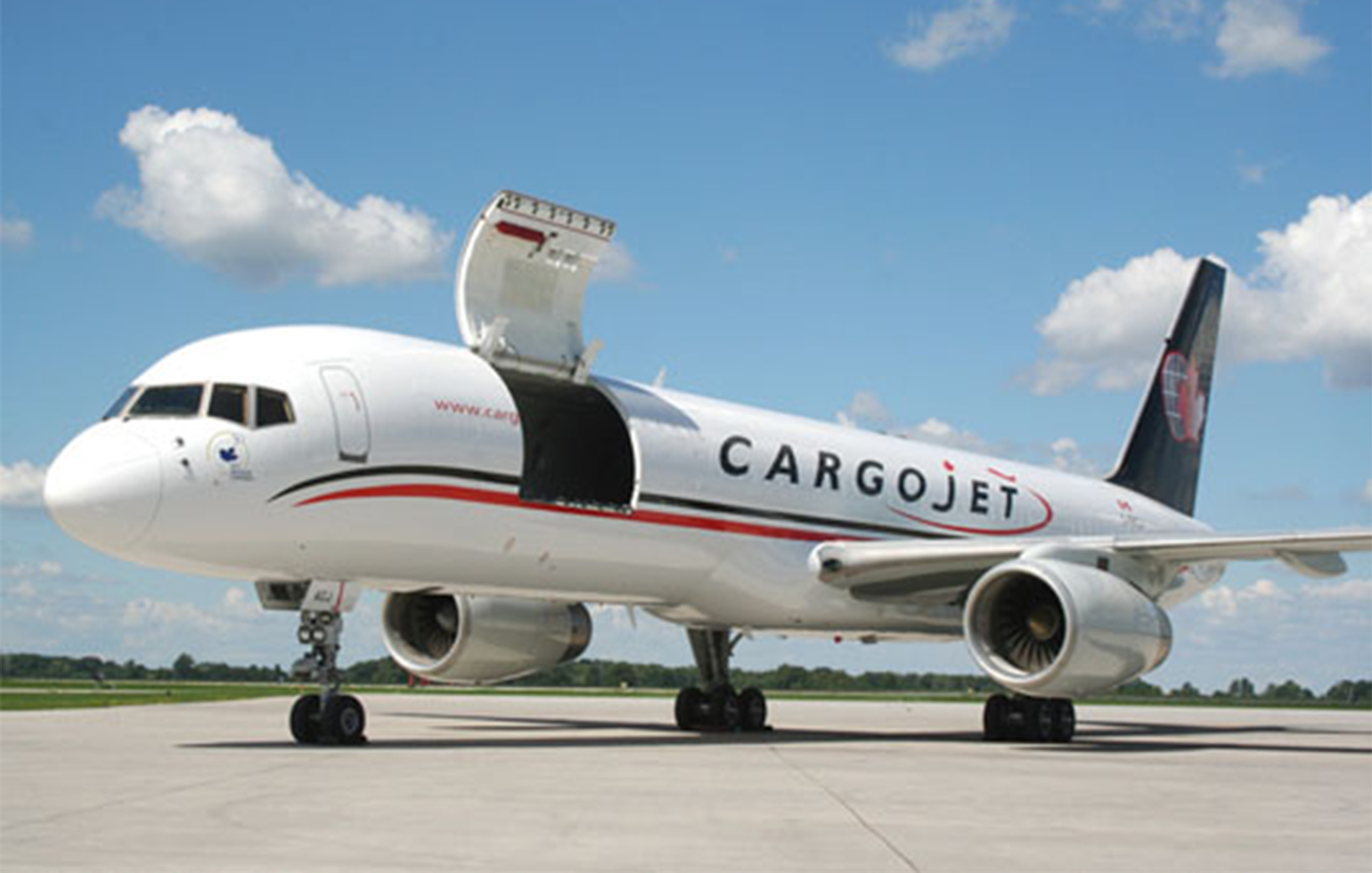 Boeing B757F cargo charter aircraft with sideloading freight door open