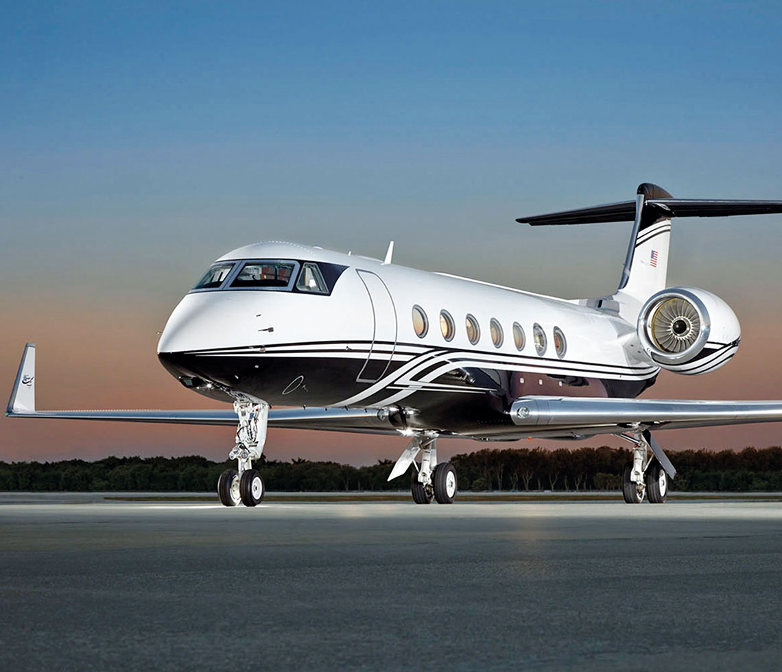 Gulfstream G550 private jet charter on runway